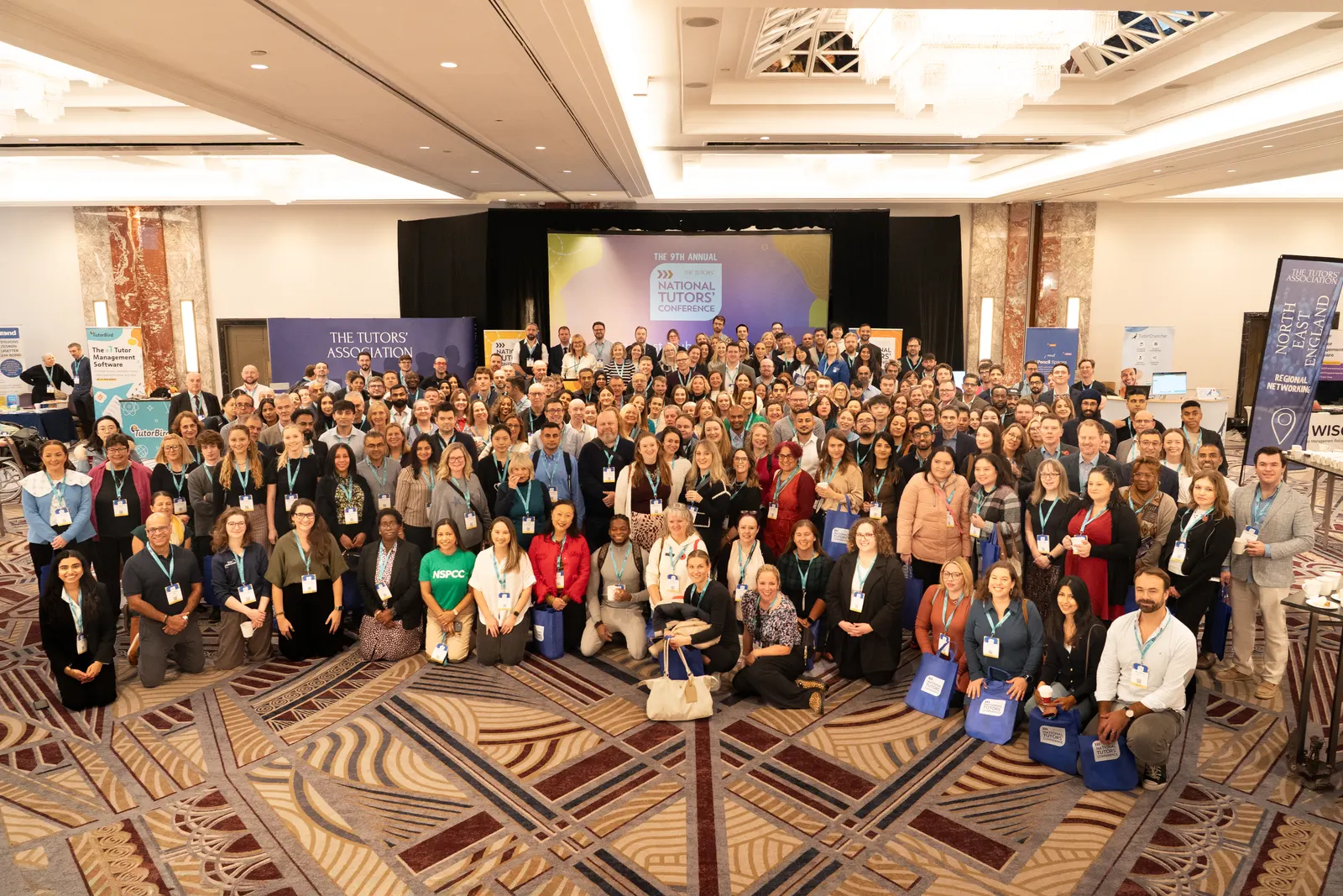 Delegates gathered at the 9th National Tutors' Conference in front of The Tutors' Association stage